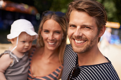 Buy stock photo Portrait, beach and family with a kid, vacation and parents with happiness, summer and weekend break. Face, mother and father with child, hug and relax with adventure, tropical island and bonding