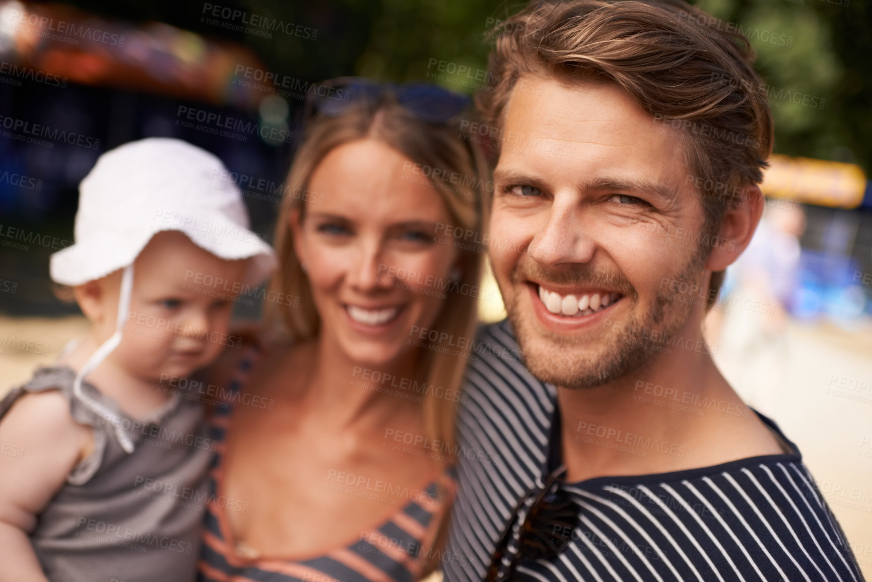 Buy stock photo Portrait, beach and family with a kid, vacation and parents with happiness, summer and weekend break. Face, mother and father with child, hug and relax with adventure, tropical island and bonding