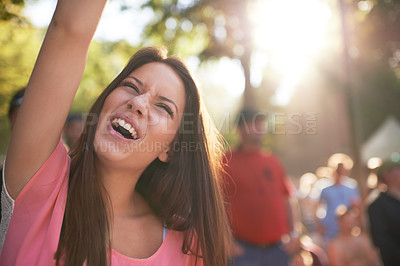 Buy stock photo Dance, music and festival with woman in crowd for celebration, party and energy. Dancer, new years concert and rock event with happy person in countryside for social, rave club and summer disco