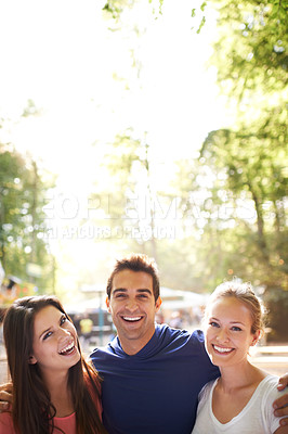 Buy stock photo A group of friends having fun together outdoors - with copy space