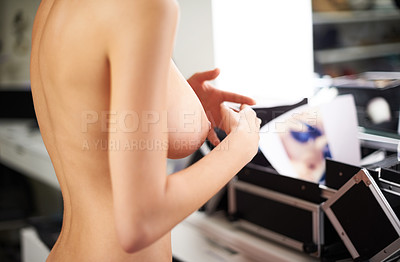 Buy stock photo Shot of a topless model in a dressing room