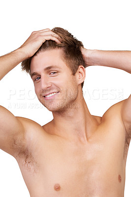 Buy stock photo Portrait of a handsome young man with his hands in his hair