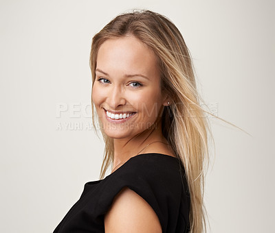 Buy stock photo Smile, beauty and face portrait of a woman on a white background with glow, salon treatment and wind. Headshot of female model in studio with cosmetics, hairstyle and happy facial expression