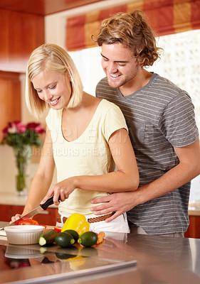 Buy stock photo Couple, cutting vegetables and kitchen for healthy nutrition, dinner meal or vegetarian diet. Man, woman and knife for cooking preparation for vitamin salad food together, home hug for eating hungry