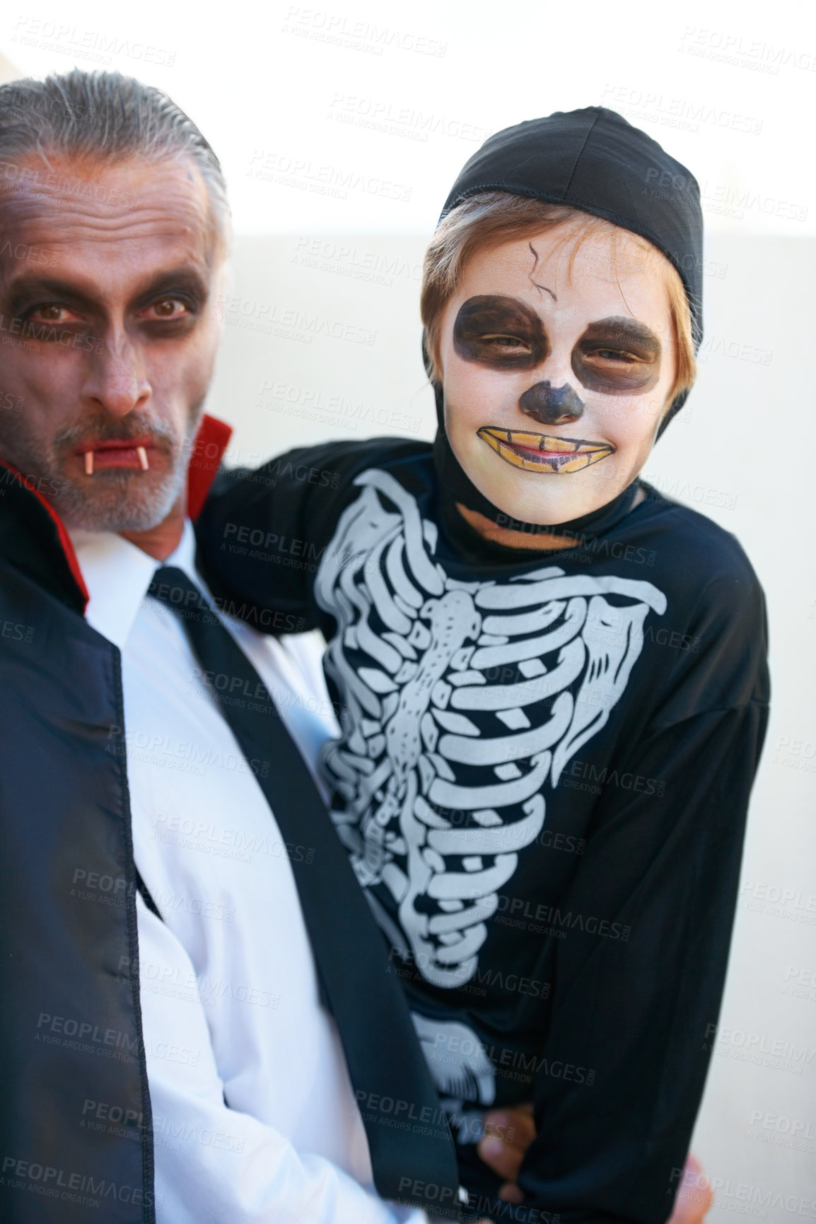 Buy stock photo Portrait, halloween and costume with a father and his son outdoor for a trick or treat tradition together. Family, horror or spook with a parent and child in an outfit for celebration in the holidays