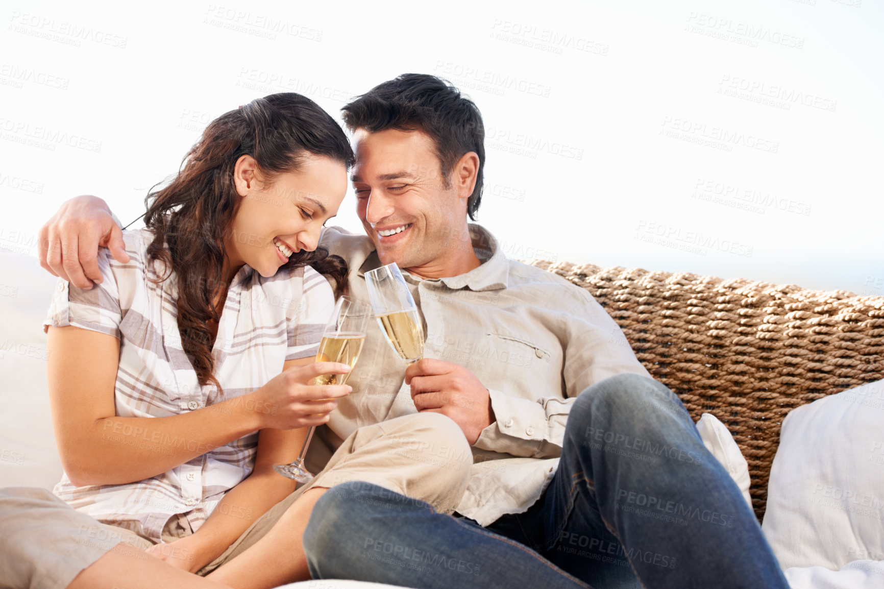 Buy stock photo Love, happy and couple with champagne for toast on honeymoon, vacation and romantic holiday. Dating, marriage and man and woman with alcohol embrace for valentines day, celebration and anniversary