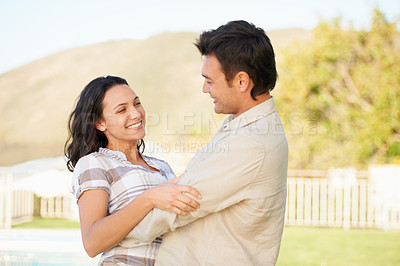 Buy stock photo Couple, happy and outdoor with embrace and honeymoon with joy, smiling and young. Marriage, loversa and love for commitment, bonding together and care for romantic relationship, man and woman
