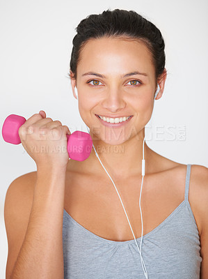 Buy stock photo Portrait, weightlifting and happy woman with headphones for fitness and arm strength. Smile, dumbell and happy female athlete with music for training and workout on a white studio background