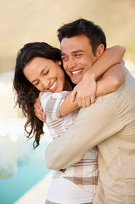 Buy stock photo Couple, happy and outdoor with hug, honeymoon and joy with embrace, young and connect. Marriage, smile and love for commitment, bonding together and care for romantic relationship, man or woman
