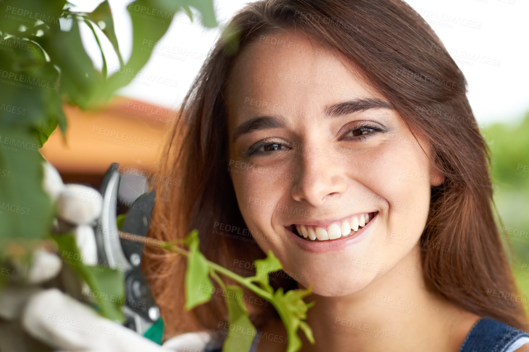 Buy stock photo Closeup portrait of an attractive young woman working in her garden