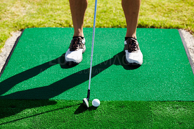 Buy stock photo Cropped image of a golfer about to tee off