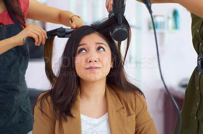 Buy stock photo Cropped shot of an attractive young woman in the hair salon
