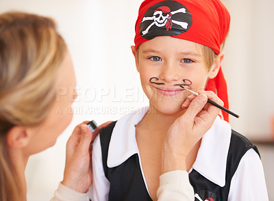 Buy stock photo Boy, portrait or pirate face paint with woman, halloween or holiday happiness in childhood in home. Child, mother and theme make up for vacation, clothes and love care for party celebration in house