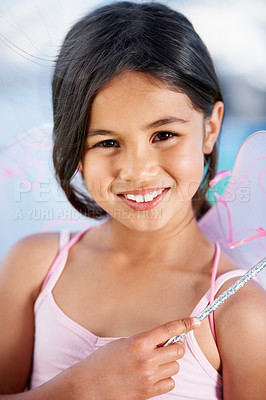 Buy stock photo Portrait, child and a girl in a fairy costume to play a game closeup in her home for a happy childhood. Face, kids and smile with an adorable young person indoor for magic at a birthday party