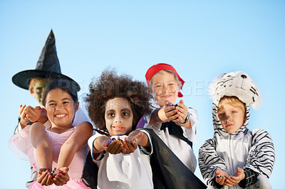 Buy stock photo Children, hands and portrait for halloween costume for sweet candy asking, trick or treat for fantasy. Friends, group and dress up as witch or pirate for holiday, kid development on sky background