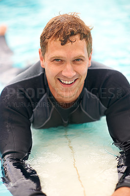Buy stock photo Portrait, man and surfer in ocean with board, health fitness and happy in summer with water sports. Person, smile and face of relax wellness in caribbean with vacation, adventure and workout on beach
