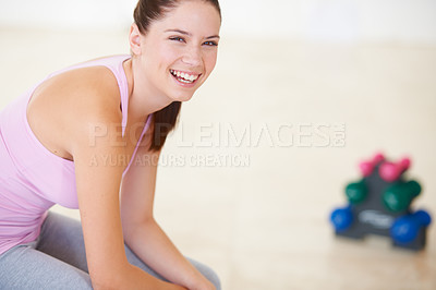 Buy stock photo Portrait, smile and fitness with woman, dumbbells and exercise with wellness center, happiness and progress. Face, person or girl with gym equipment, joy and workout with training, funny or challenge