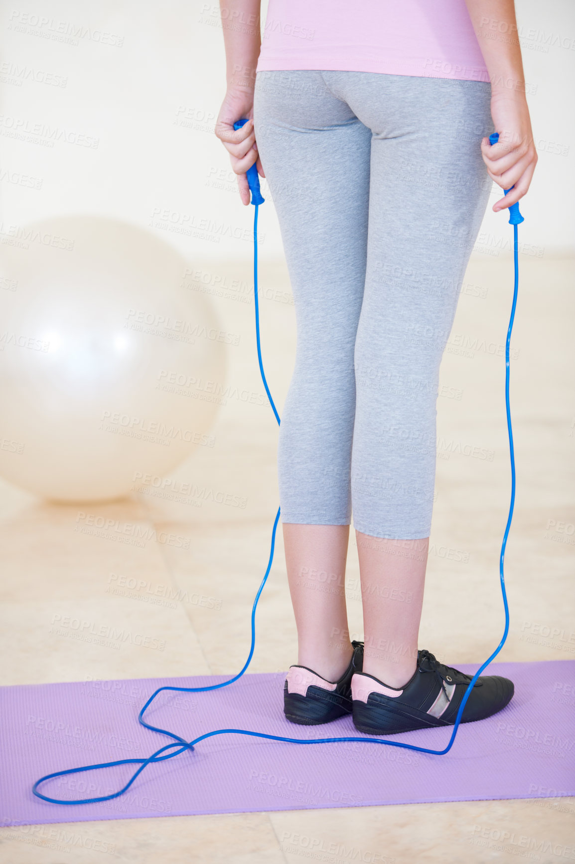 Buy stock photo Woman, skipping rope and exercise for mat cardio or progress training, workout for health fitness. Female person, sports for gym jumping or active lose weight for strong wellbeing, muscle or balance
