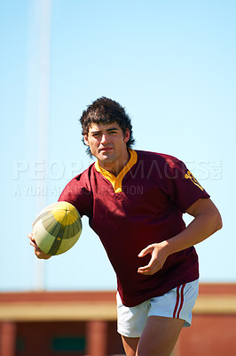 Buy stock photo Sports, fitness and man with rugby, ball or pass at a field for training, match or hobby outdoor. Football, face and male athlete at a park for game day, performance or workout, skill or practice 