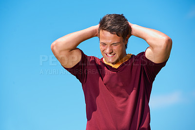 Buy stock photo Face, rugby and happy athlete in training, exercise or workout in sport practice on blue sky background. Sports, man and player with hands on head, thinking or idea for fitness, game and performance