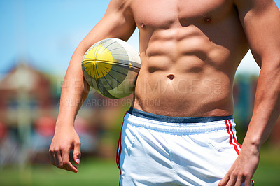 Buy stock photo Shirtless, man and rugby player holding a ball closeup for training or sports practice on a field. Body, male athlete person and playing active competitive game for health and strength outdoors 