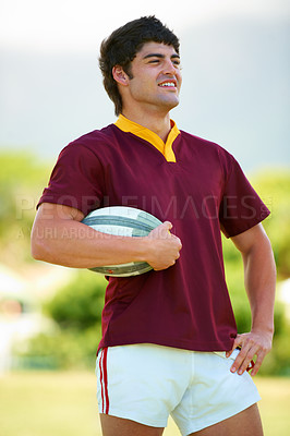 Buy stock photo Rugby, sports and athlete and man on field for training, health and stadium practice. Challenge, competition and performance with male person in outdoor pitch for exercise, games and workout