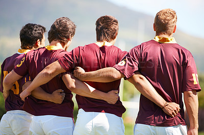 Buy stock photo Back, rugby team and sports with men in a line outdoor on a field before a game or competition in summer. Teamwork, sport and unity with male athletes or players getting ready for training or a match