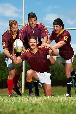 Buy stock photo Success, sports and rugby team excited for match win on a green field with a ball. Happiness, fitness and professional training group with uniform and victory from playing exercising athlete and game