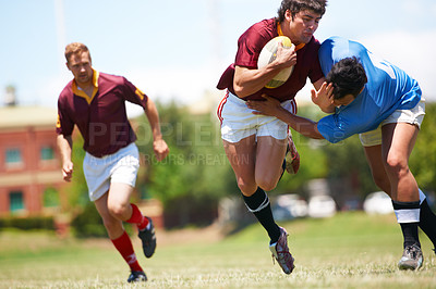 Buy stock photo Fitness, sports and men on a field for rugby, ball or tackle action, game or power outdoor. Energy, handball and male team at a park for competitive, training or practice, workout or active challenge