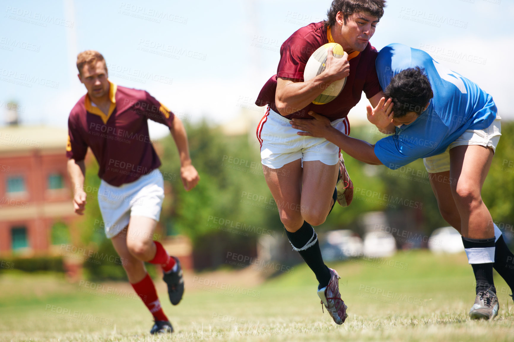 Buy stock photo Fitness, sports and men on a field for rugby, ball or tackle action, game or power outdoor. Energy, handball and male team at a park for competitive, training or practice, workout or active challenge