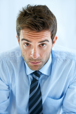 Buy stock photo Businessman, portrait and serious in office for career, professional and employee at corporate job. Entrepreneur, face or person for assertive, confidence and pride with calm expression at workplace 
