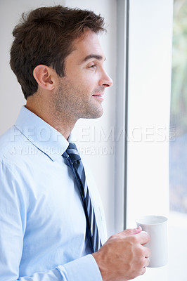 Buy stock photo Business man, drinking coffee and thinking at window, smile and happy for idea, vision and mission. Male person, reflection and tea for plan, positive mindset and confidence for career or future