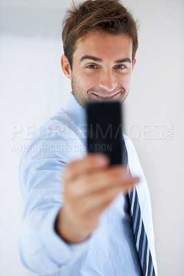 Buy stock photo Happy businessman, selfie and photography for memory, social media or online vlog at office. Portrait of handsome man, face or employee smile for photograph, picture or business fashion at workplace