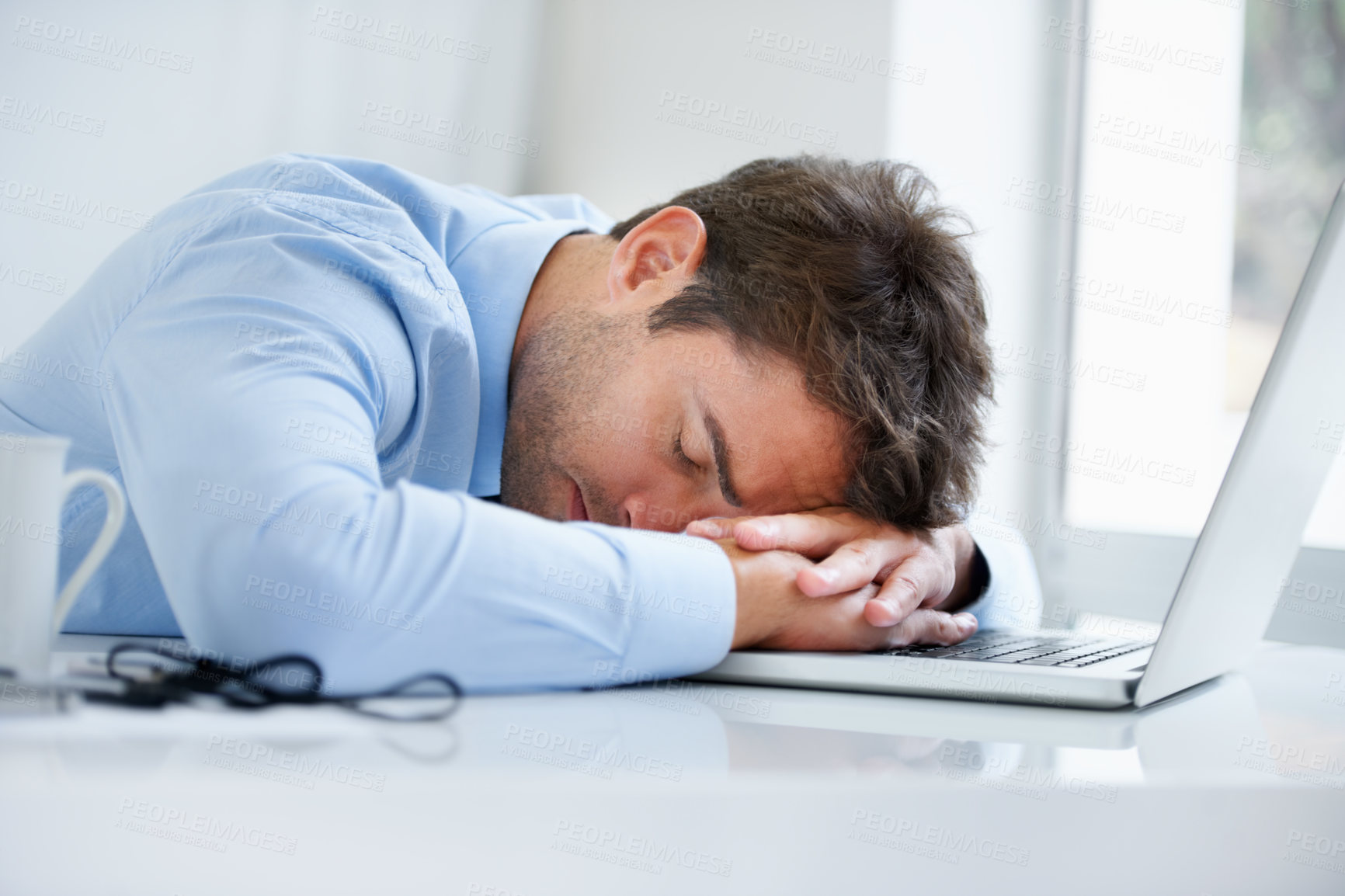 Buy stock photo Businessman, laptop and sleeping on office desk in burnout, stress or fatigue from pressure or overworked. Tired man or employee asleep on table with computer in mental health or anxiety at workplace