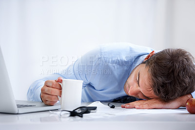 Buy stock photo Business man, sleeping and tired at work, burnout and exhausted or mental health, desk and overwhelmed. Male person, dreaming and lazy in office, resting and fatigue or low energy, coffee and nap