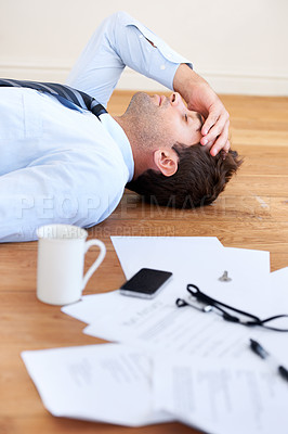 Buy stock photo Businessman, stress and headache or burnout, floor and exhausted or mental health, paperwork and overwhelmed. Male person, migraine and tired or frustrated, rest and fatigue for mistake and fail