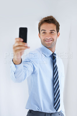 Buy stock photo Cropped shot of a handsome young businessman at work