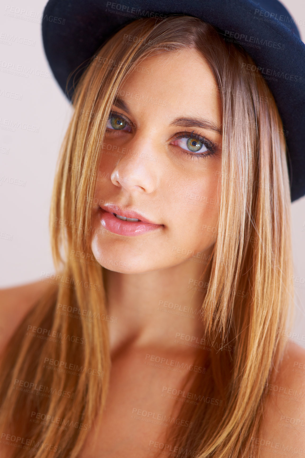 Buy stock photo Fashion, closeup and portrait of woman in studio with cool attitude, confidence and pride. Aesthetic, beauty and face of person with accessories, hat and cosmetics for style on white background