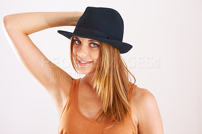 Buy stock photo Portrait, woman and smile with hat in studio for fashion, confidence and good mood isolated on white background. Happy, young and cool model with fedora accessory, summer style or hipster personality