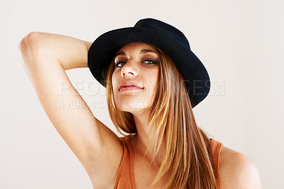 Buy stock photo Portrait, woman and hat in studio for fashion, confidence and good mood isolated on white background. Face of happy, young and cool model with fedora accessory, summer style and pride in personality