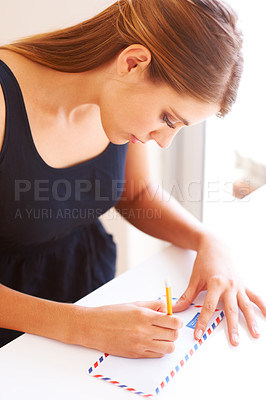 Buy stock photo Cropped view of a woman writing a letter