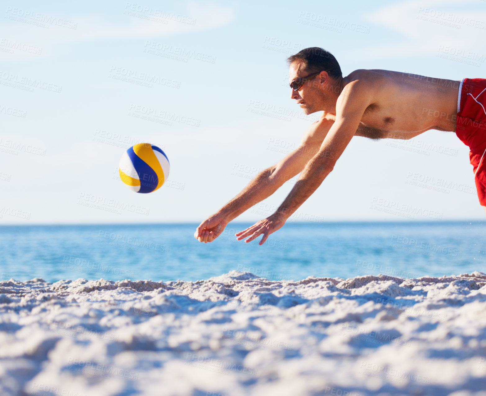 Buy stock photo Beach, sports man and jump for volleyball in game, competition or outdoor nature challenge, practice or fitness. Blue sky, ocean sea sand or athlete leap for volley ball in match, exercise or contest