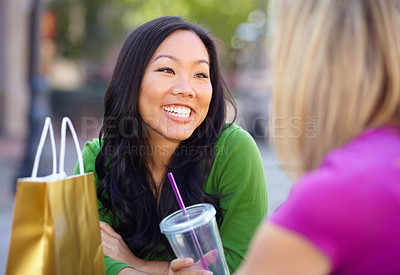 Buy stock photo Shopping, coffee shop and friends in the city for lunch together while bonding over a retail sale. Cafe, smile or happy with an asian woman customer and friends talking outdoor in an urban town