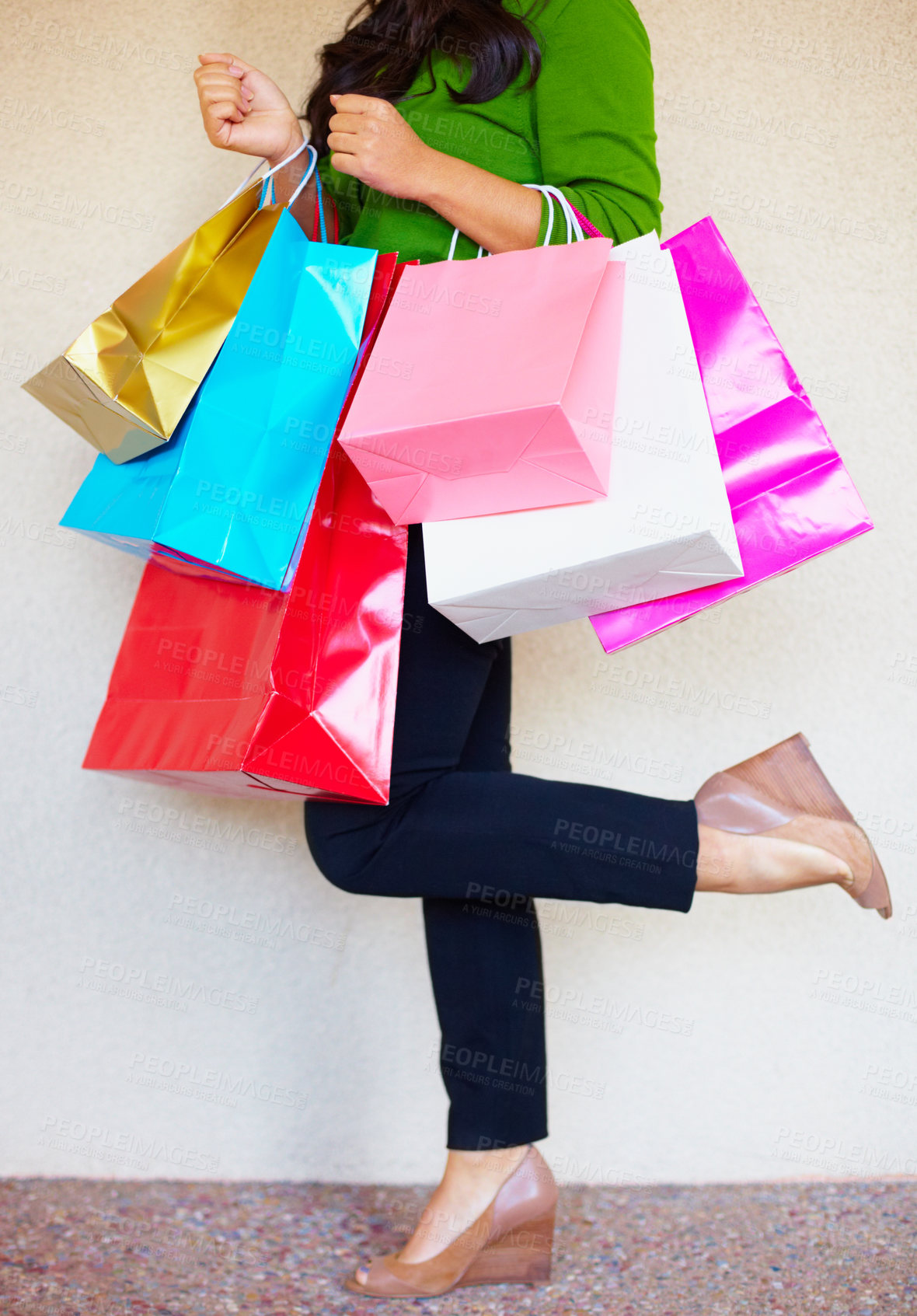 Buy stock photo Shopping, legs and bags with a woman customer in studio on a white background for retail consumerism. Fashion, sale and shoes with a female consumer at a mall, store or luxury market as a shopper