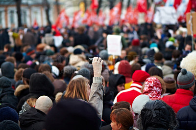 Buy stock photo Rear view shot of a group of protesters