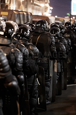 Buy stock photo The army barricading a riot in the city