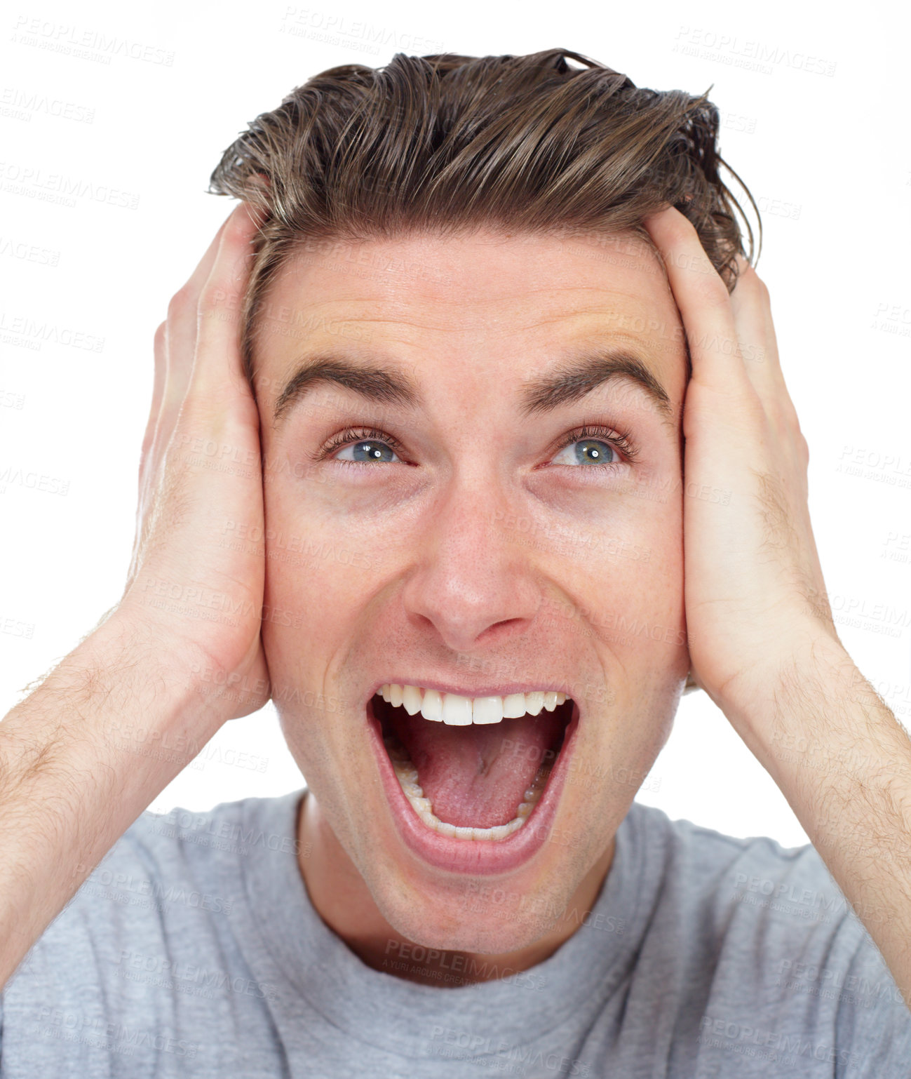 Buy stock photo Excited, face and man closeup in a studio with happiness from deal and announcement with smile. Isolated, white background and male person happy and shouting from good news, winning and surprise