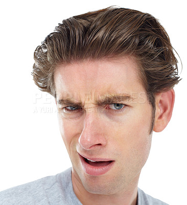 Buy stock photo Confused, closeup and portrait of man in studio for frustrated, disgusted and doubt. Goofy, displeased and unhappy with face of male isolated on white background for wow, funny and crazy expression