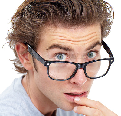 Buy stock photo Surprised, portrait and man in glasses with shock, worry or anxiety closeup on white studio background. Omg, wow or wtf and nerd, geek reaction and fear, stress, shocked expression and isolated face