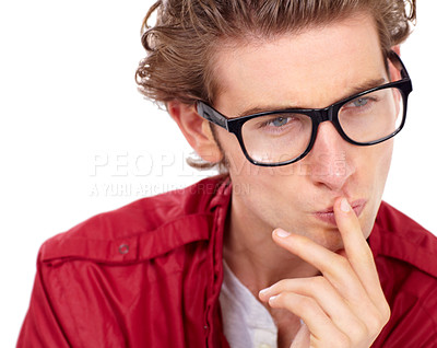 Buy stock photo Handsome young man wearing spectacles looking contemplative